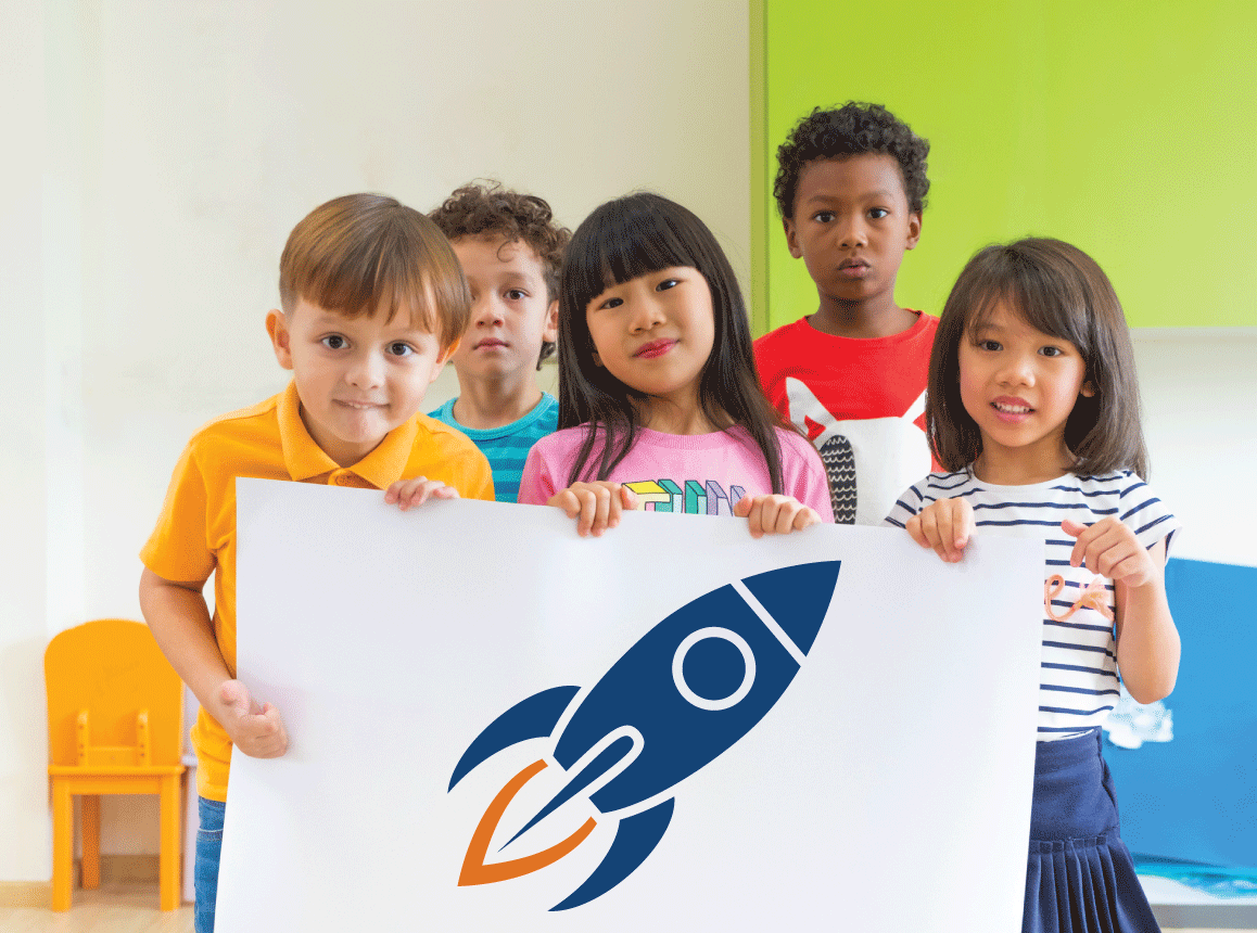 Diverse group of children holding poster with rocket graphic