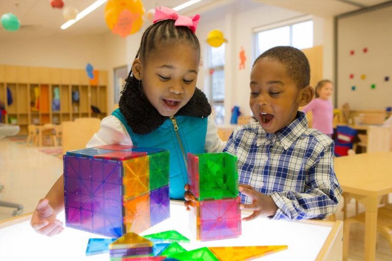 children playing with magnatiles