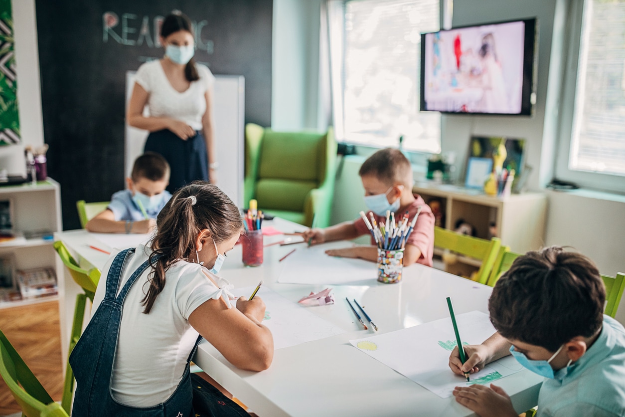 Children wearing masks at school