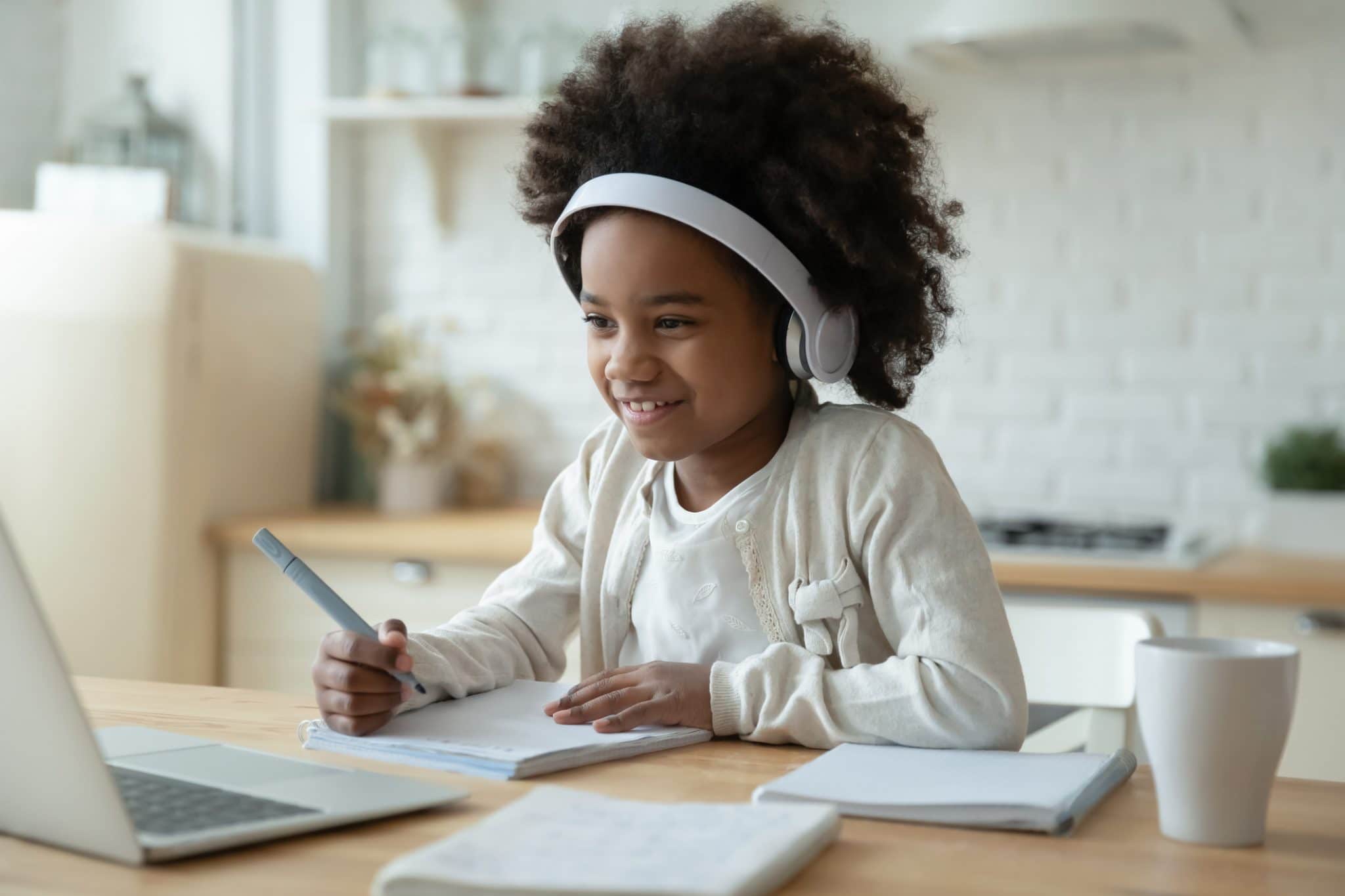 Girl smiling during virtual learning